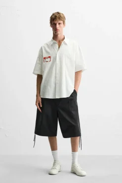 Sale CAMISA RAYAS ESTAMPADO PEGATINA Hombre Camisas