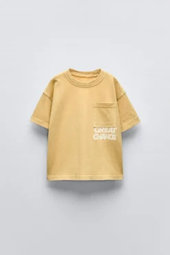 Niños ZARA 1½ - 6 Años·Camisetas|6 - 18 Meses·Camisetas<CAMISETA TEXTO BOLSILLO