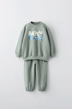 Niños ZARA 1½ - 6 Años·Sudaderas|1½ - 6 Años·Pantalones<CONJUNTO JOGGING SUDADERA Y PANTALÓN BLUEY © LUDO STUDIO