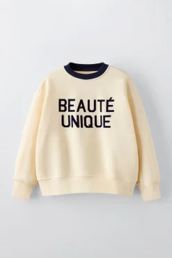 Niños ZARA 6 - 14 Años·Sudaderas<SUDADERA TEXTO FLOCK