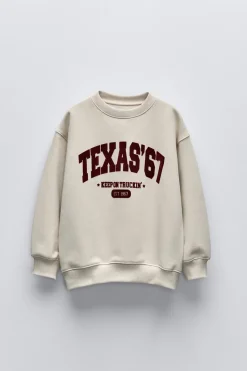 Niños ZARA 6 - 14 Años·Sudaderas<SUDADERA TEXTO FLOCK